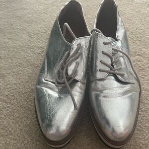 Size 8M silver loafers. Abound shoes.